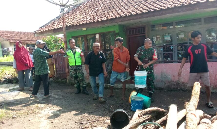 Aksi cepat Babinsa Koramil 1304/Panumbangan Pelda Eli Kusliana dan Sertu Ujang Saepudin